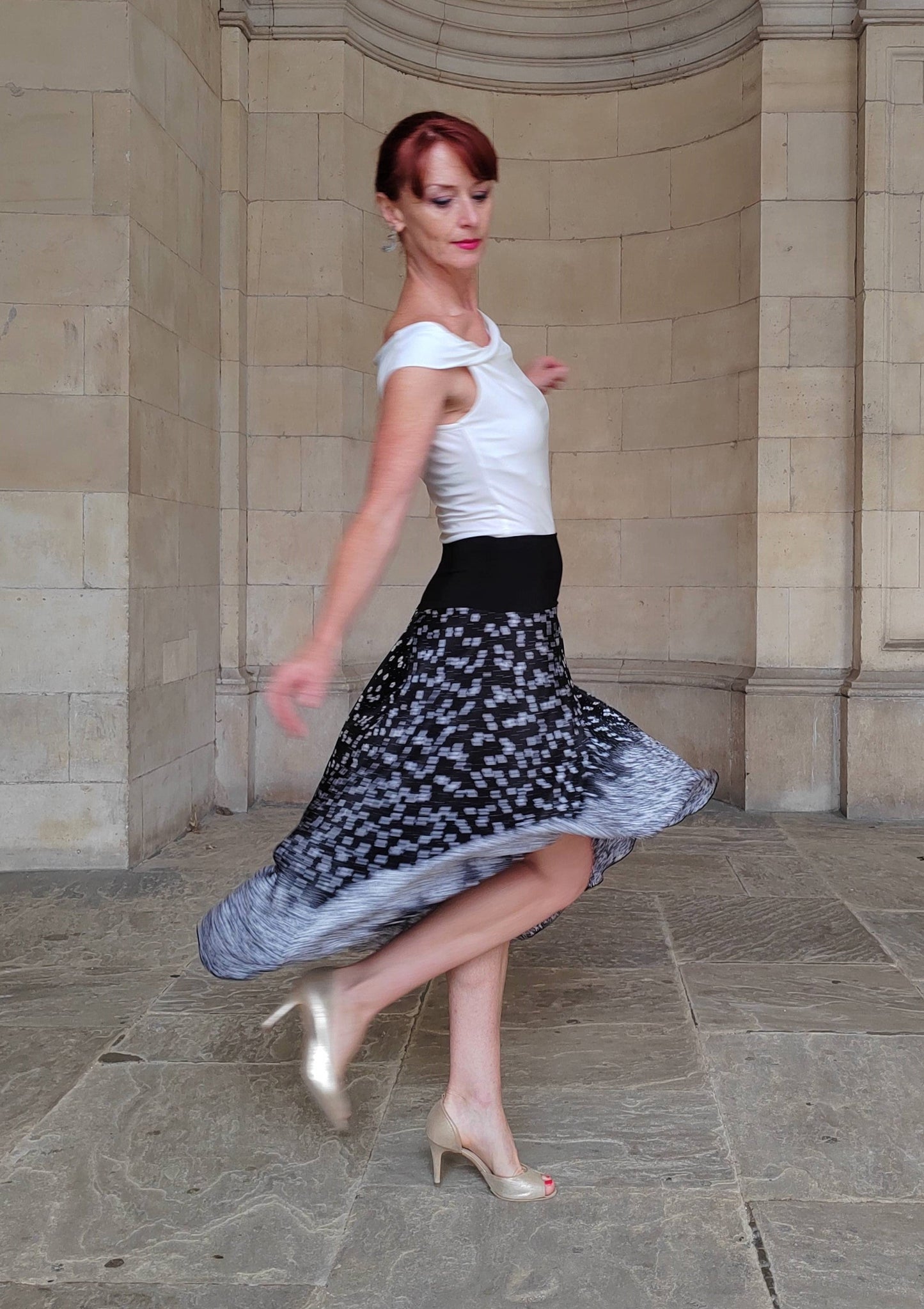 PLEATED SKIRT with decorative Border Print